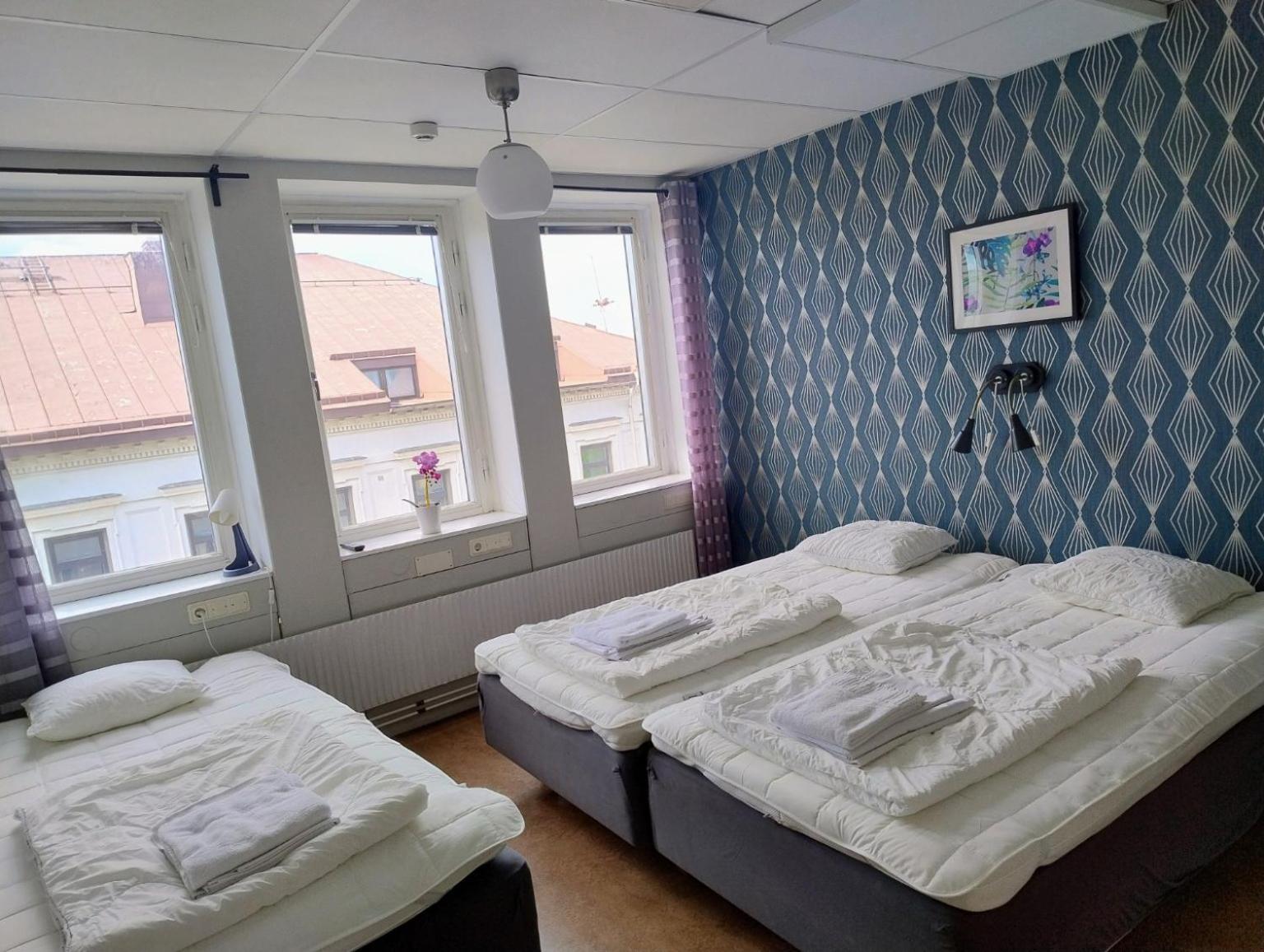 Triple Room with Shared Bathroom